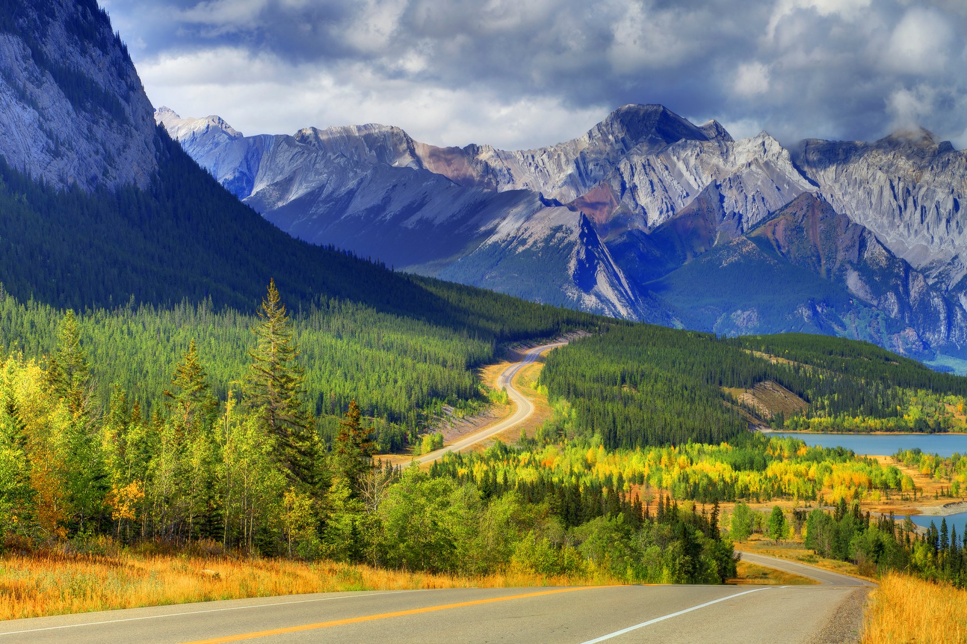 abraham lake banff alberta canada sky mountain lake forest tree autumn road cloud