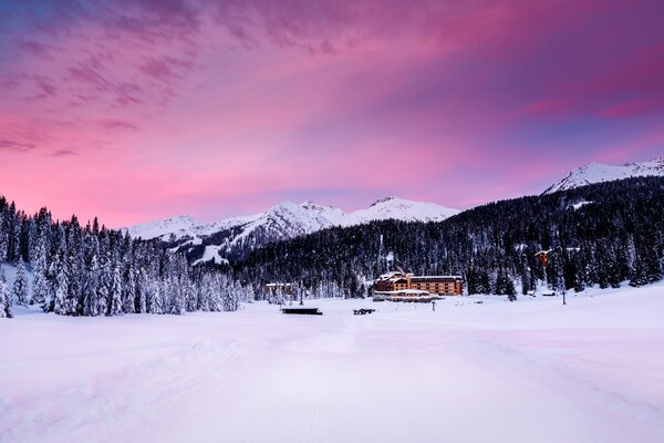 Snow-capped mountains of Italy, a hut in the mountains