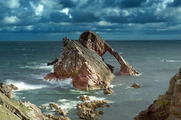 Rocky clouds on the sea