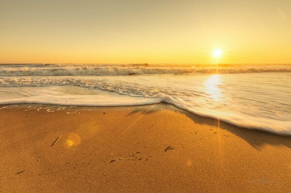 Deserted beach at sunset