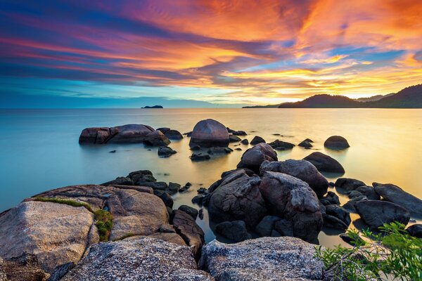 Sunrise on a rocky beach