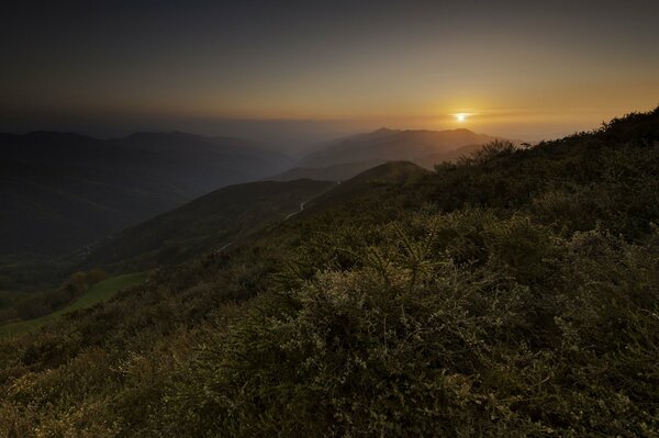 Beautiful sunset on the background of mountains