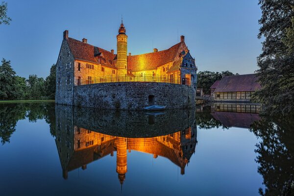 Castle on the water in the evening