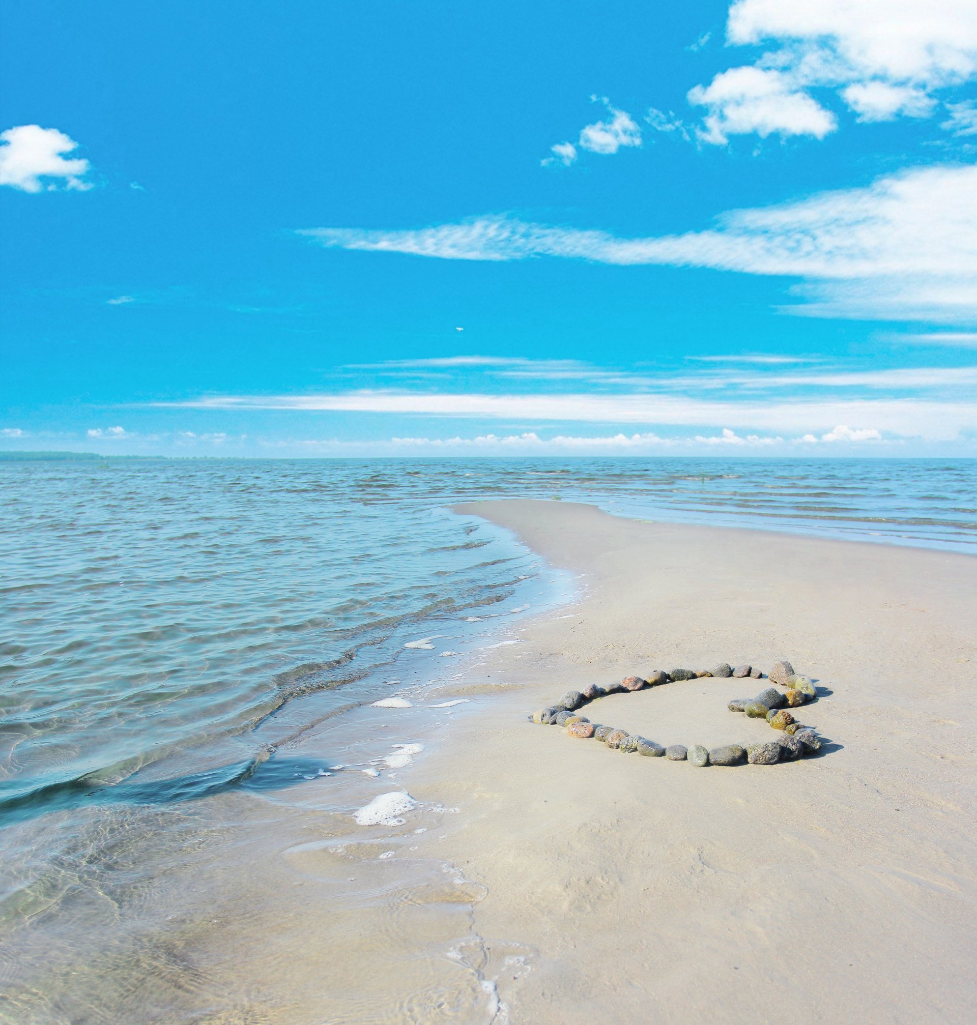 ea sky heart heart love romance sun water sand stones clouds landscape waves beauty shore beach