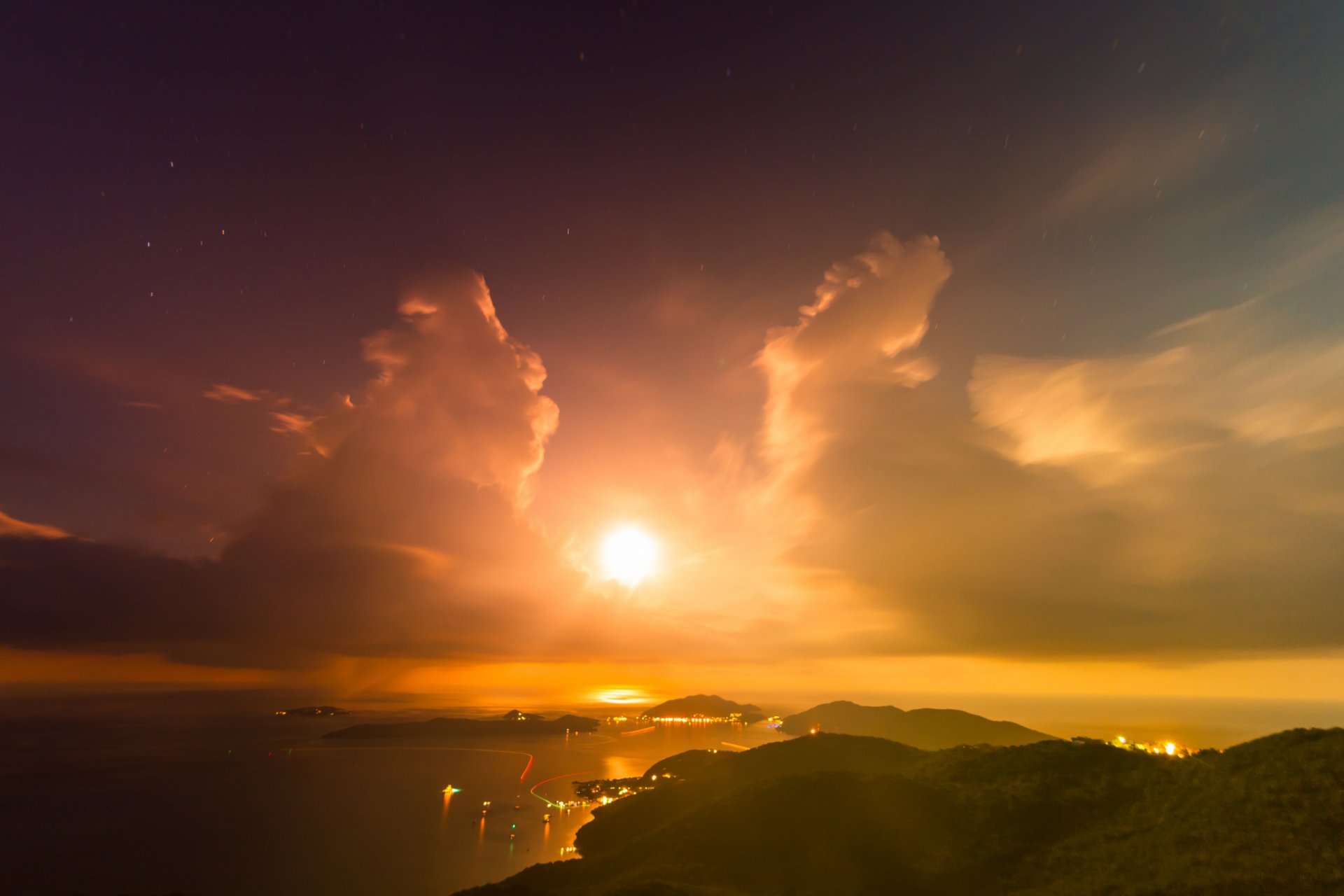 montañas bahía islas sol nubes tarde puesta de sol luces