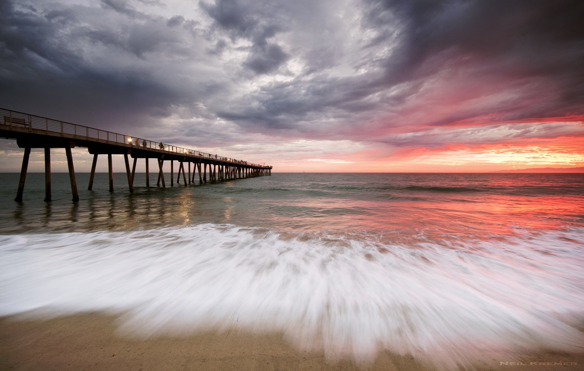 mare spiaggia molo tramonto nuvole