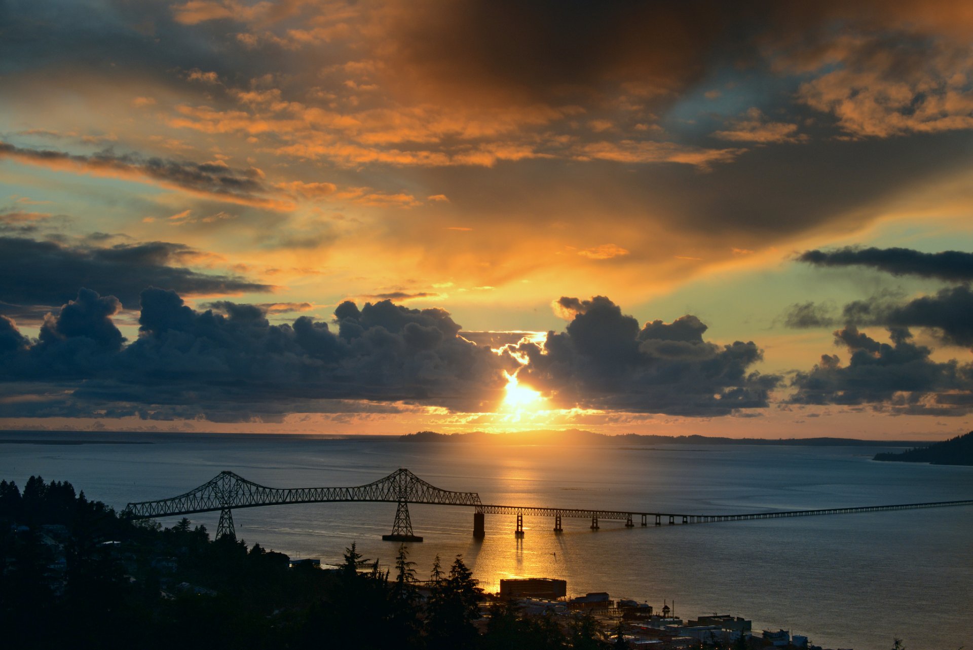 gulf bridge sun clouds sunset