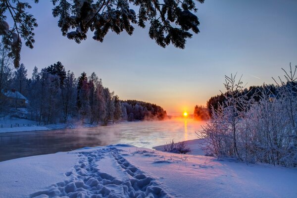 Beautiful winter sunset near the river