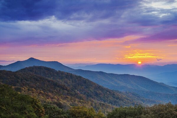 Dawn in the morning in the mountains in the forest