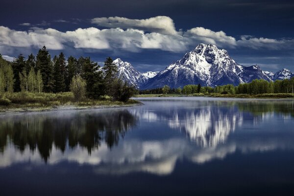 Mount Moran is displayed in the Snake River