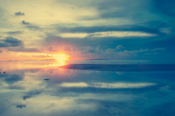 Nature landscape: sea, sunset and clouds