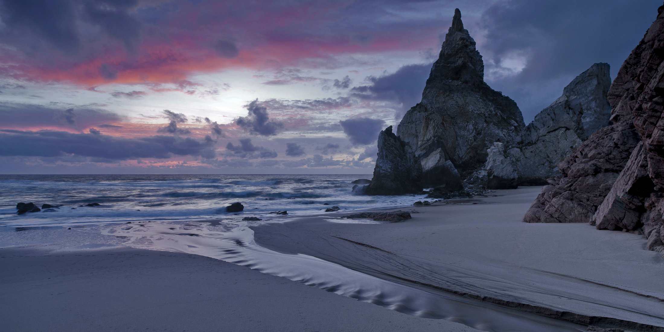 portugal mer côte sable surf roches soirée crépuscule coucher de soleil ciel nuages nuages