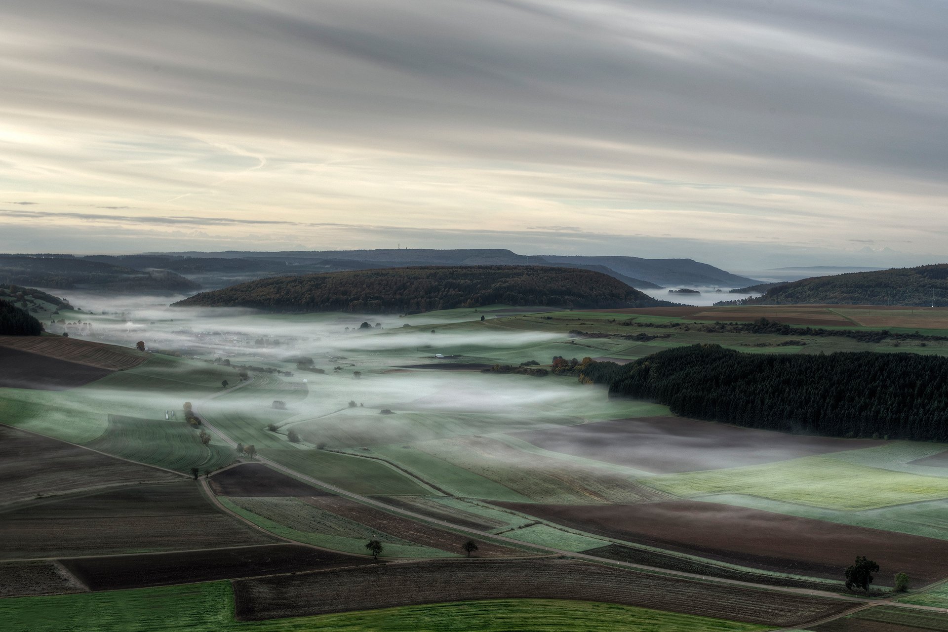 germany autumn morning fog haze valley of the field forest processing hdr