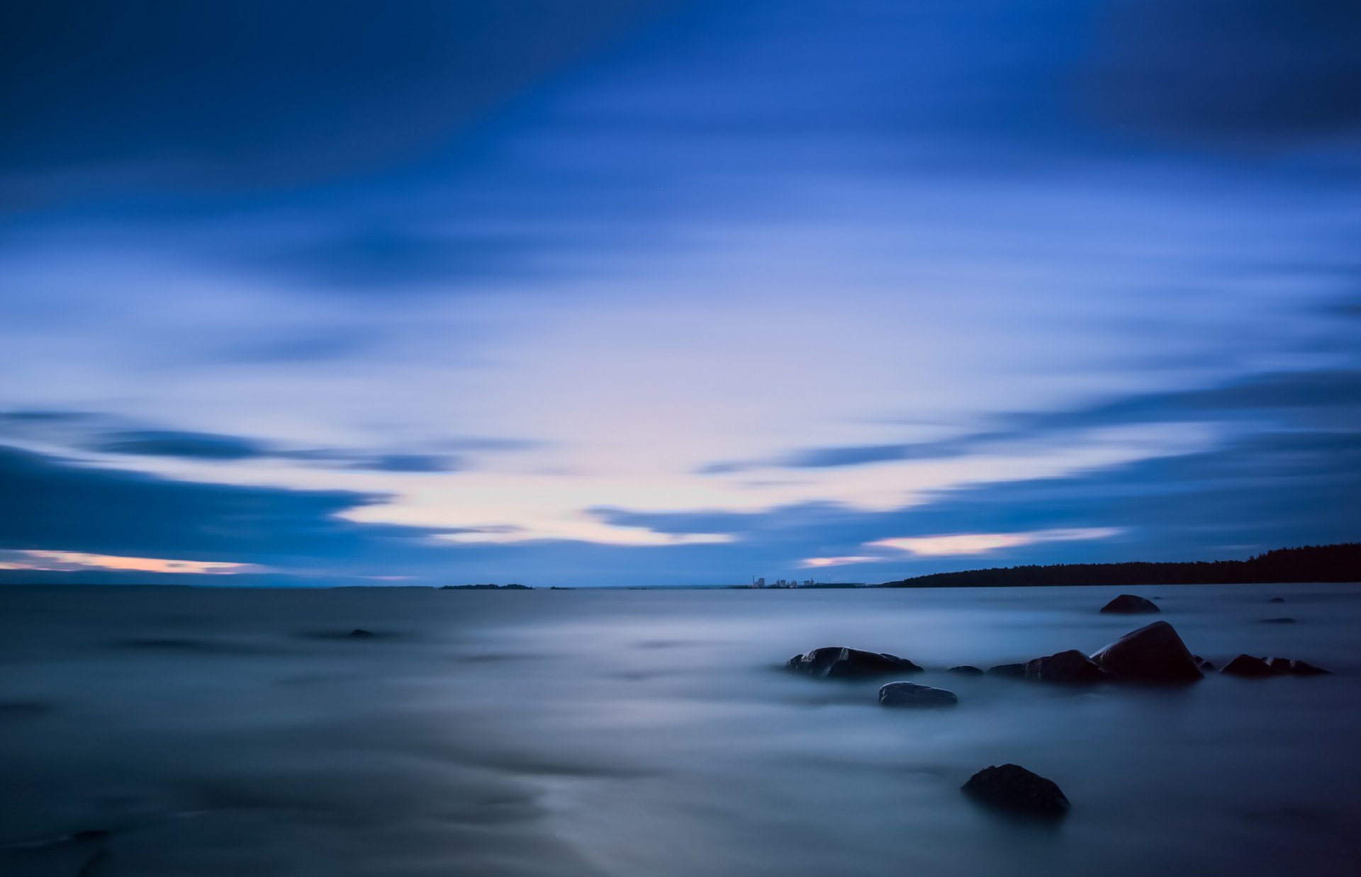 weden karlstad lake beach stones night sky clouds blue