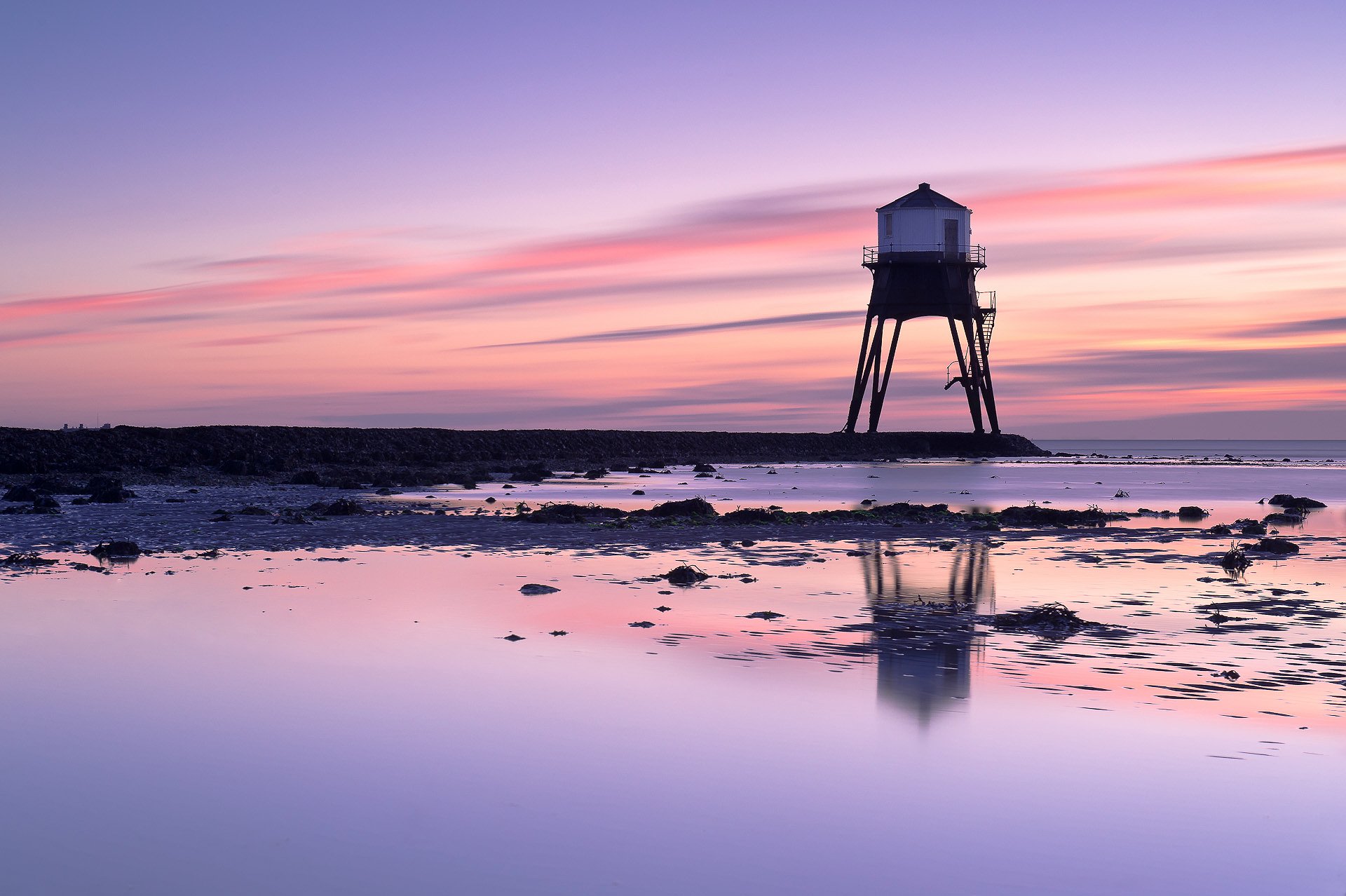 united kingdom england beach lighthouse sea dawn lilac sky