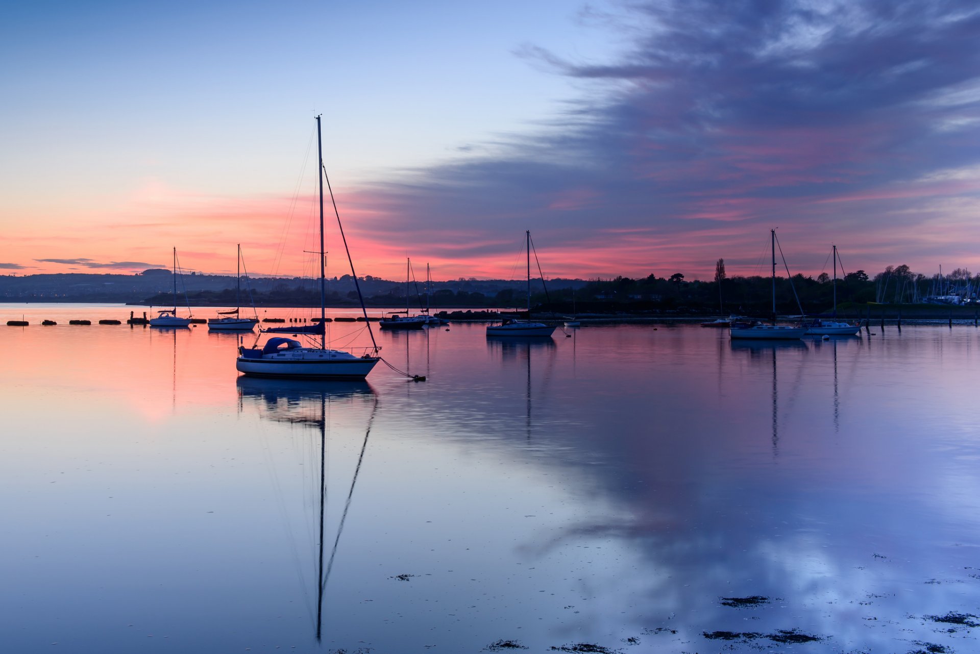 united kingdom england hampshire county gulf yacht night sunset sky clouds reflection