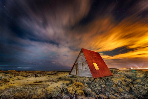 Night sky over a house in Iceland