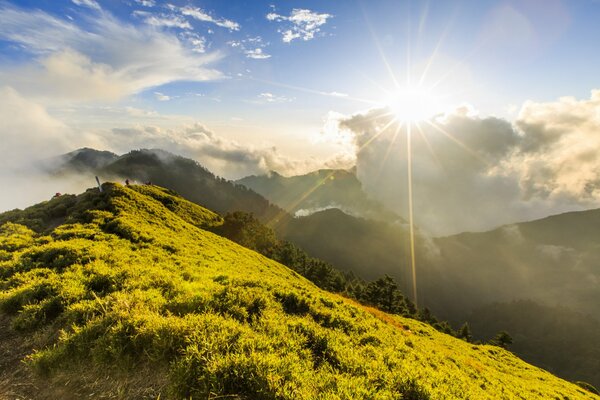 Green hills and sunny sky