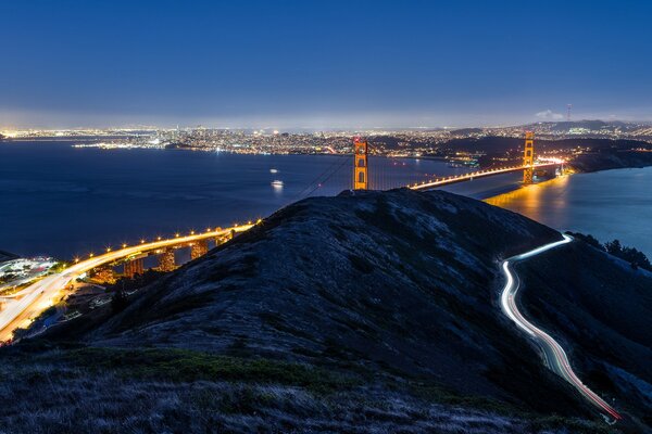 Golden Gate Bridge at night with lights