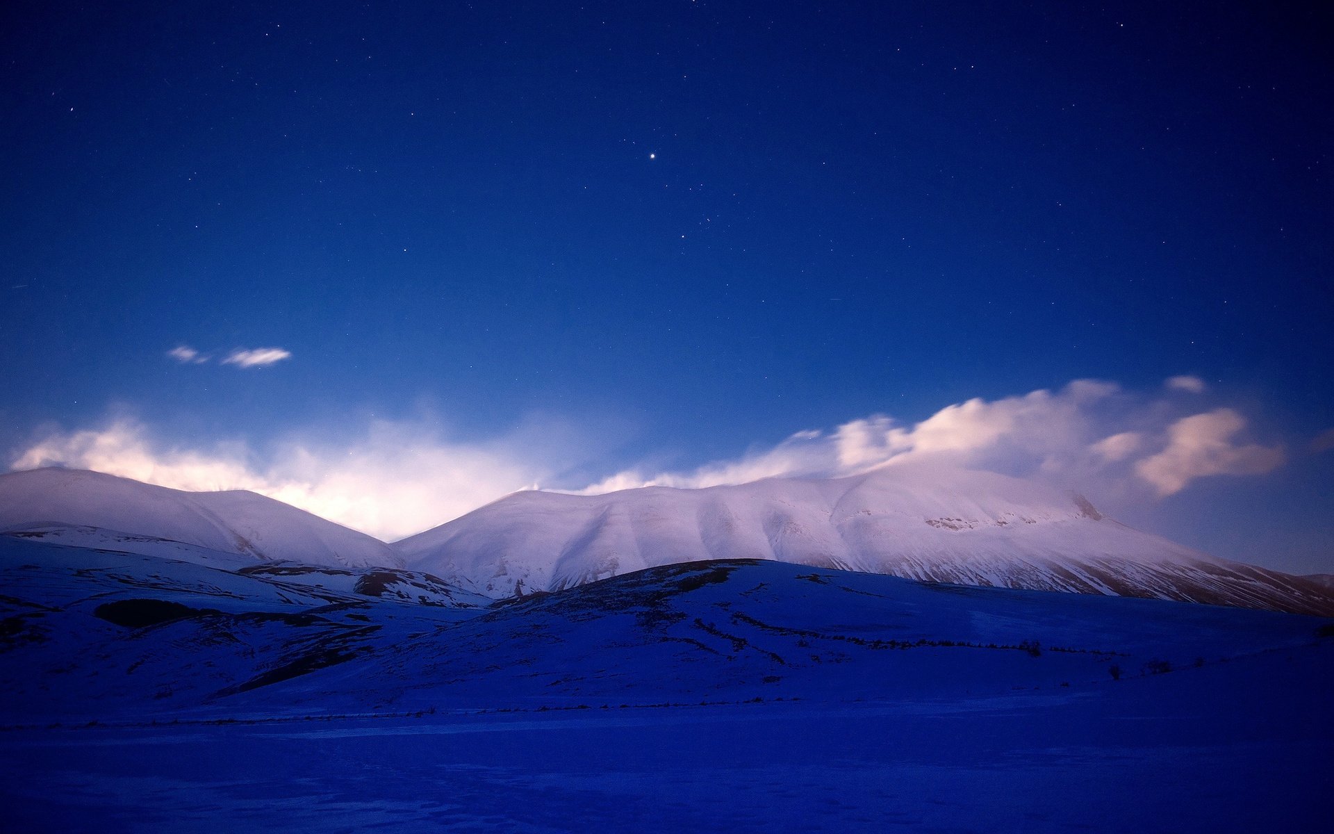 montagne neve cielo stelle