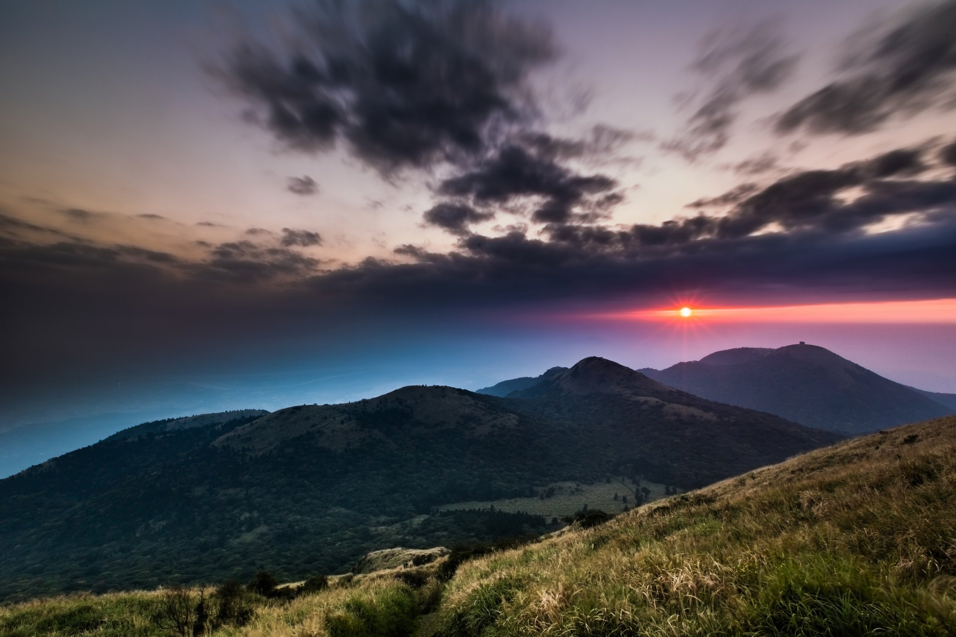 china taiwan national park mountains hills grass trees sky evening sun crimson sunset clouds cloud