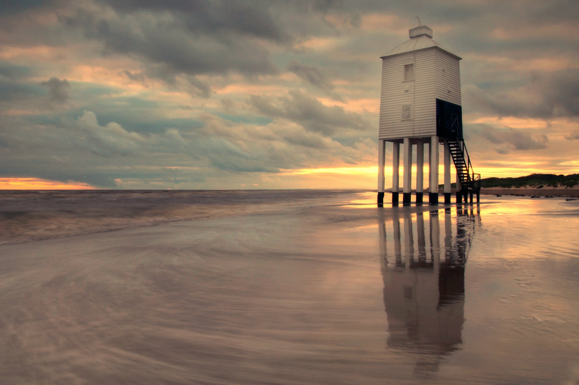 great britain england lighthouse shore sea evening sunset sky clouds cloud