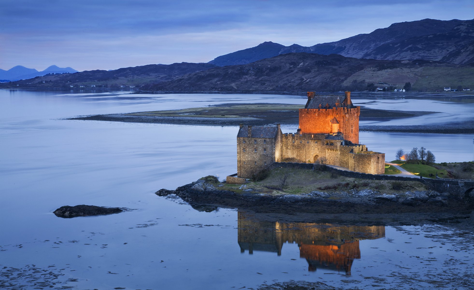 great britain scotland evening castle fortress illumination lake reflection mountains blue sky