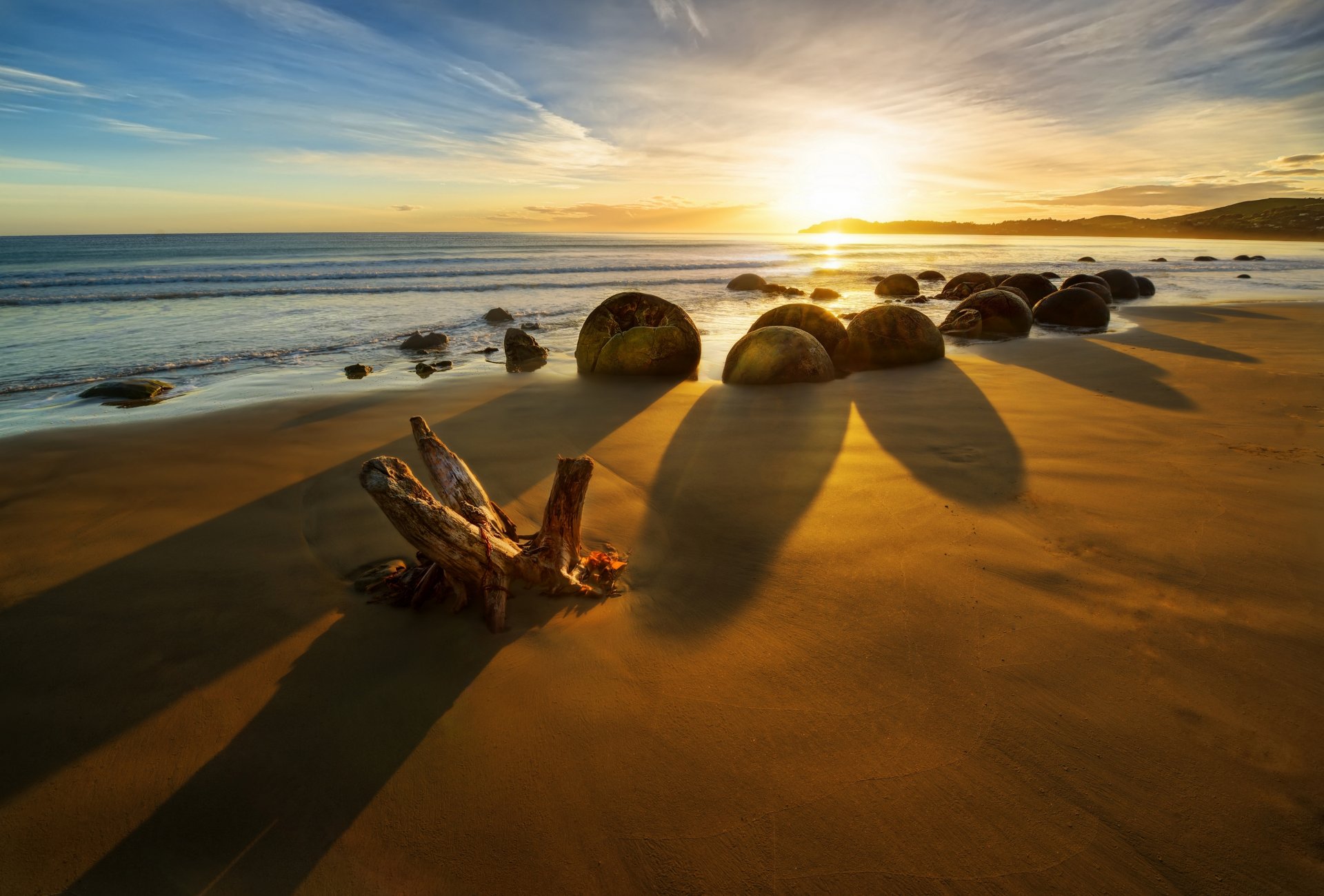 new zealand ocean sunrise stones coast