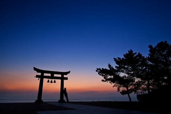 Silhouette of a man against the sunset