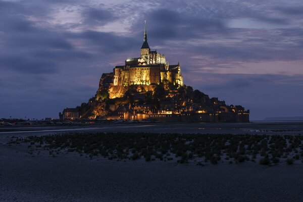 Mont Saint-Michel at night in bright lights