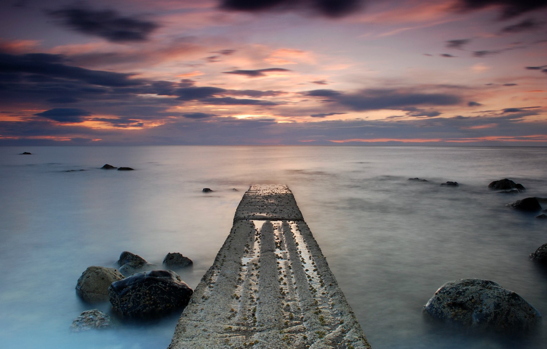 great britain scotland sea calm shore rocks evening sunset sky clouds cloud