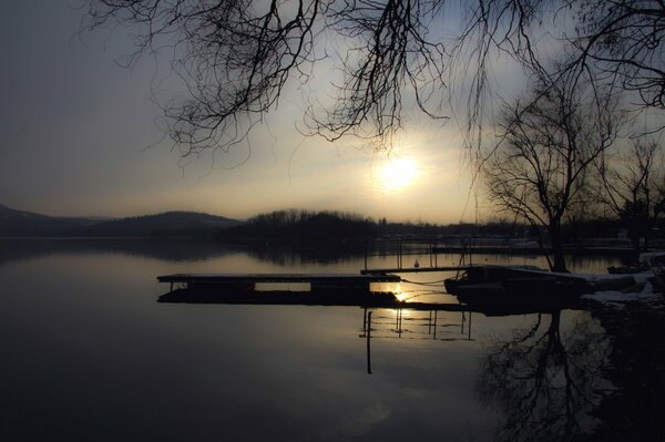 Dawn on the shore of a winter lake