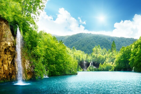 A magnificent waterfall surrounded by beautiful nature