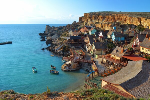 Small houses on the background of the sea