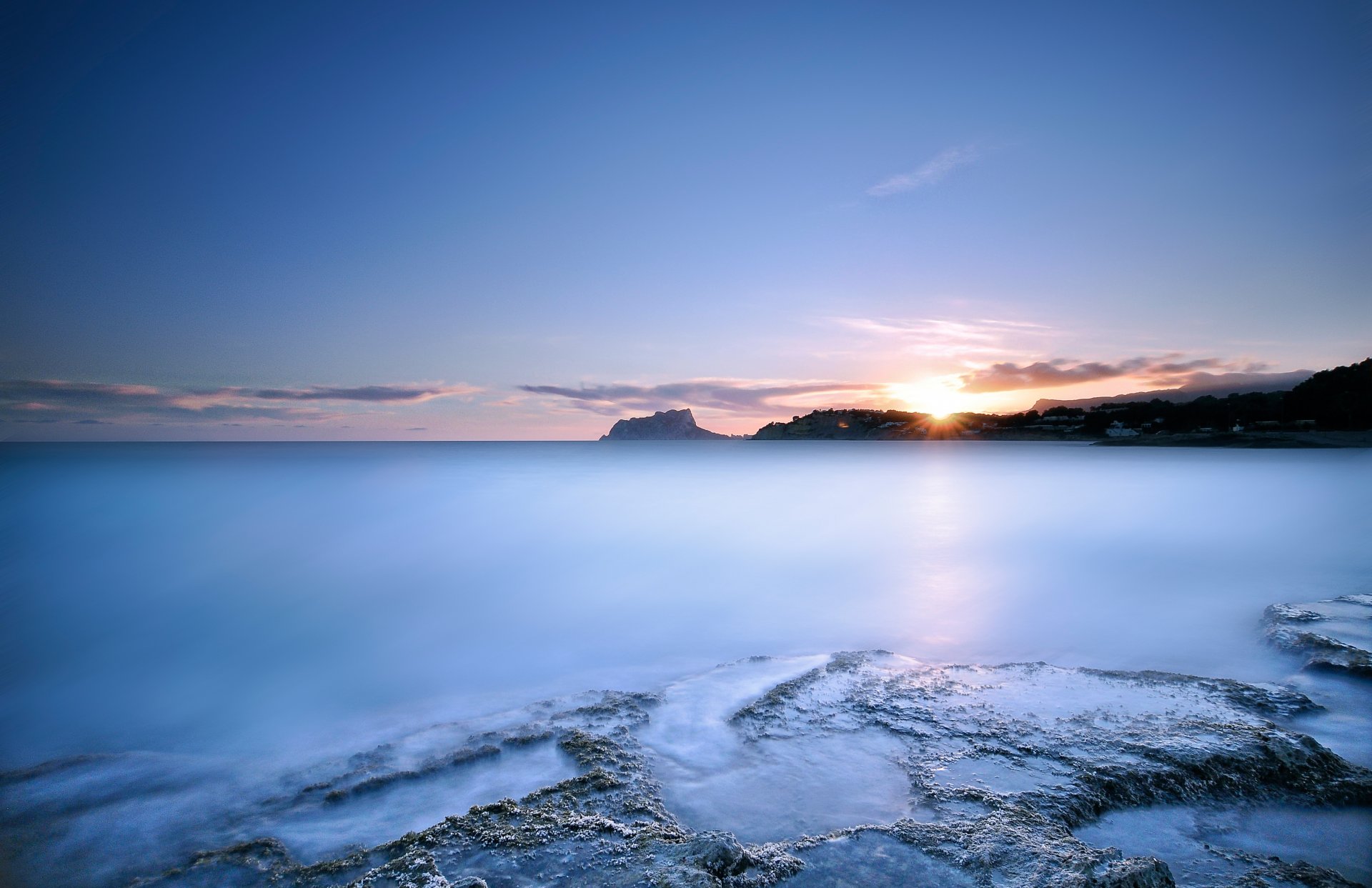 ea ocean beach water surface of blue sky clouds sun light sunset night