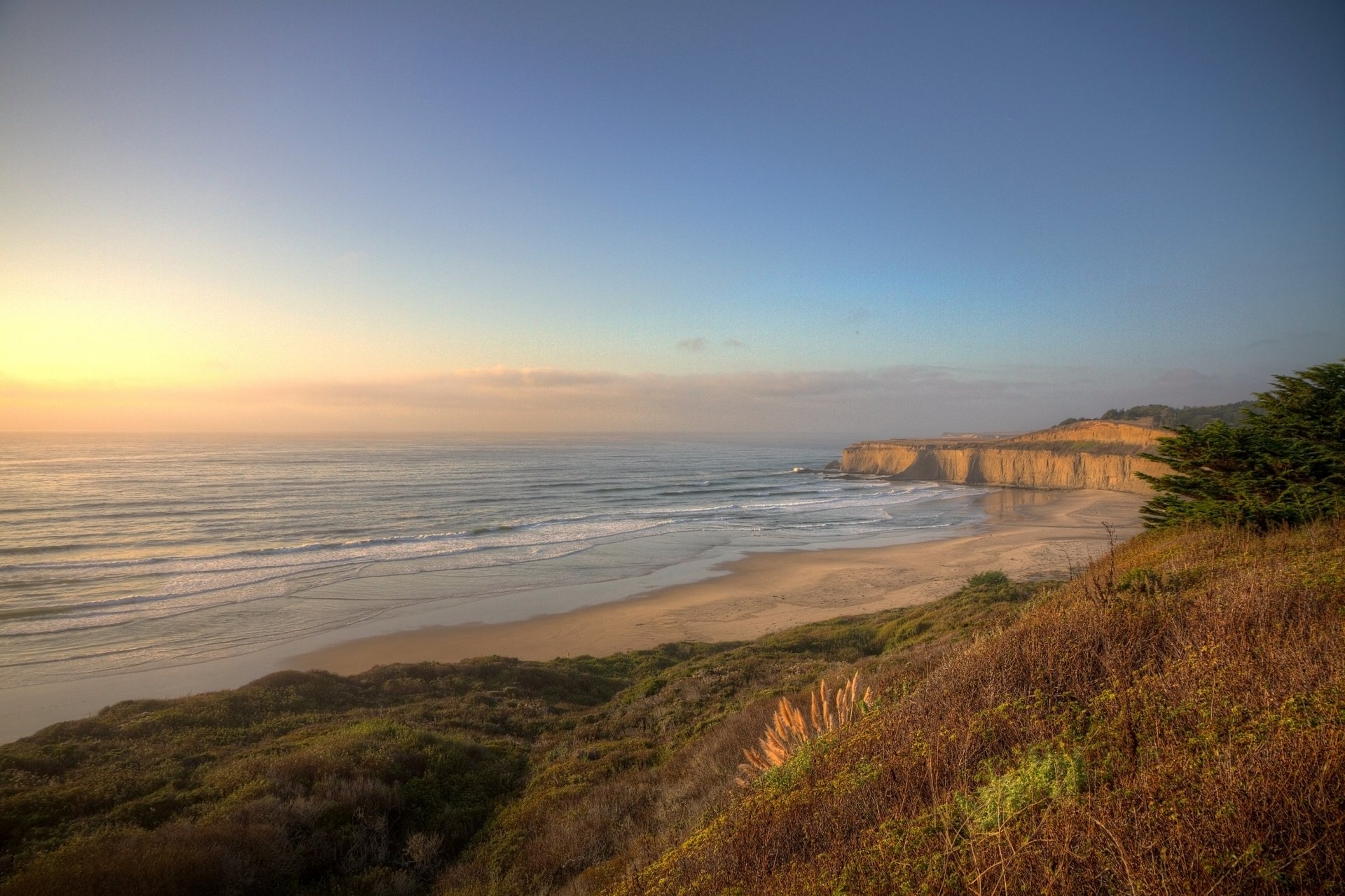 landscape nature ocean water waves beach sand grass sky sunset clouds shore 3000x1998