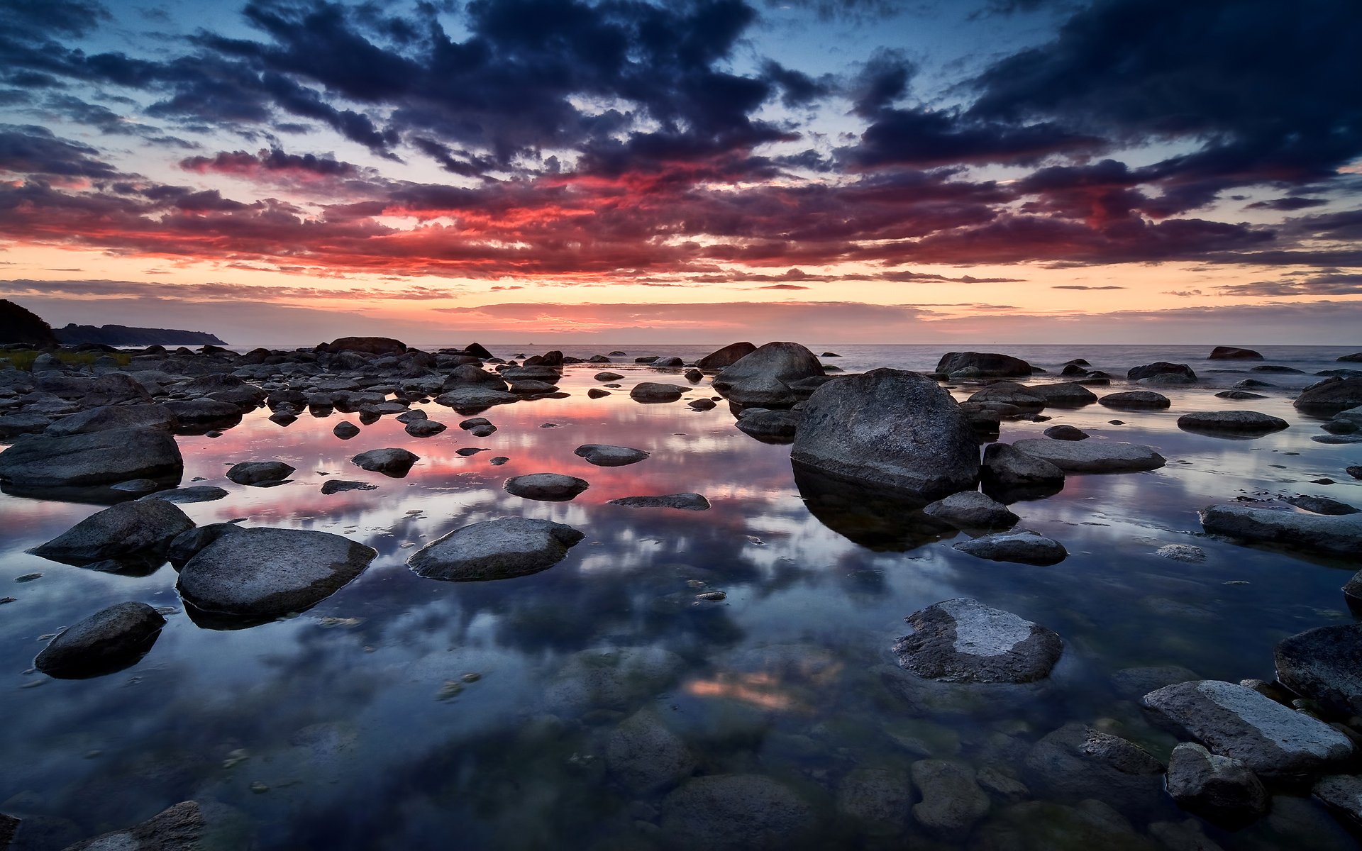 sonnenuntergang himmel wolken reflexion meer steine deutschland