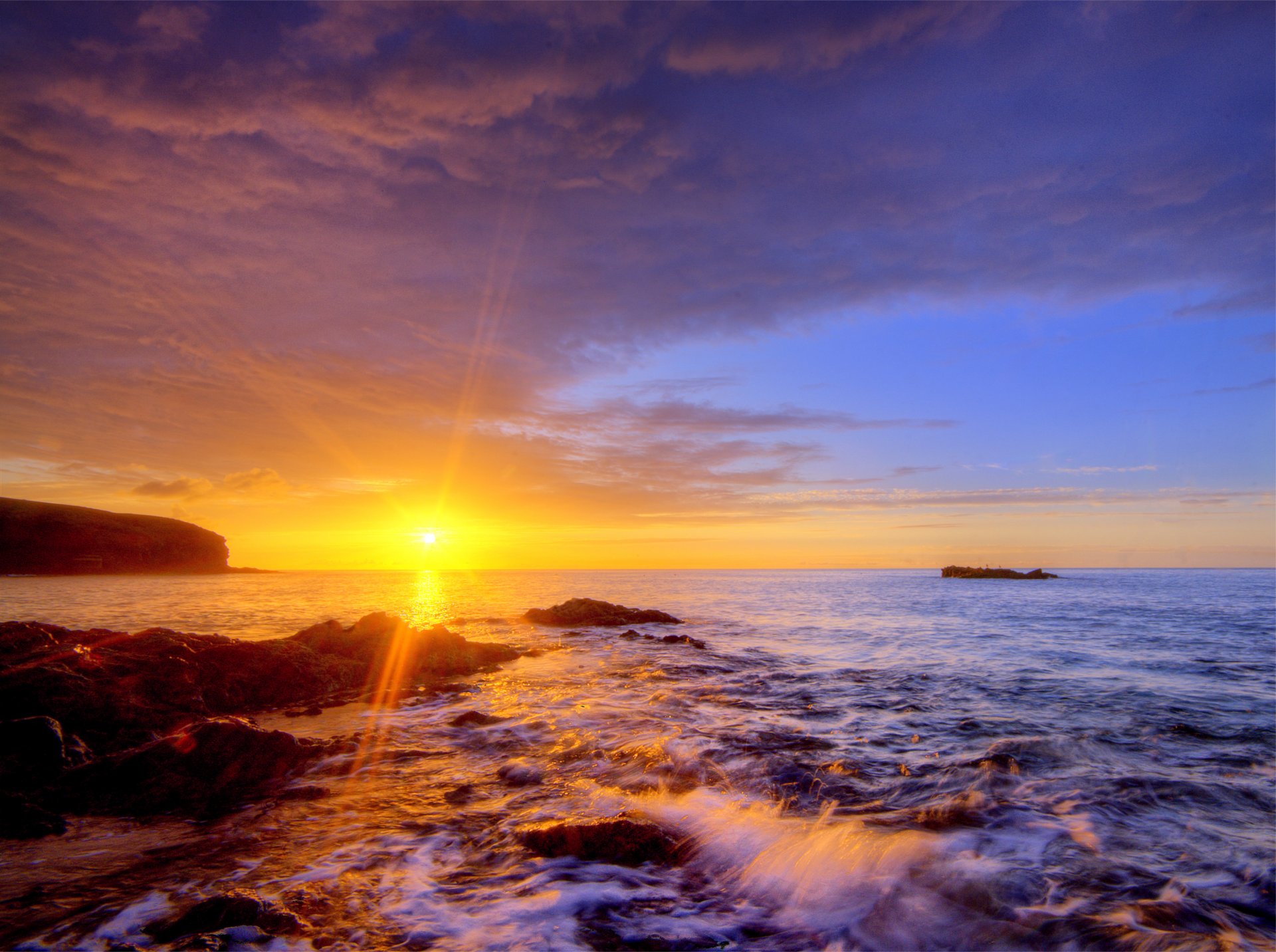 canary islands evening sunset sun light rays beach shore rocks atlantic ocean surf