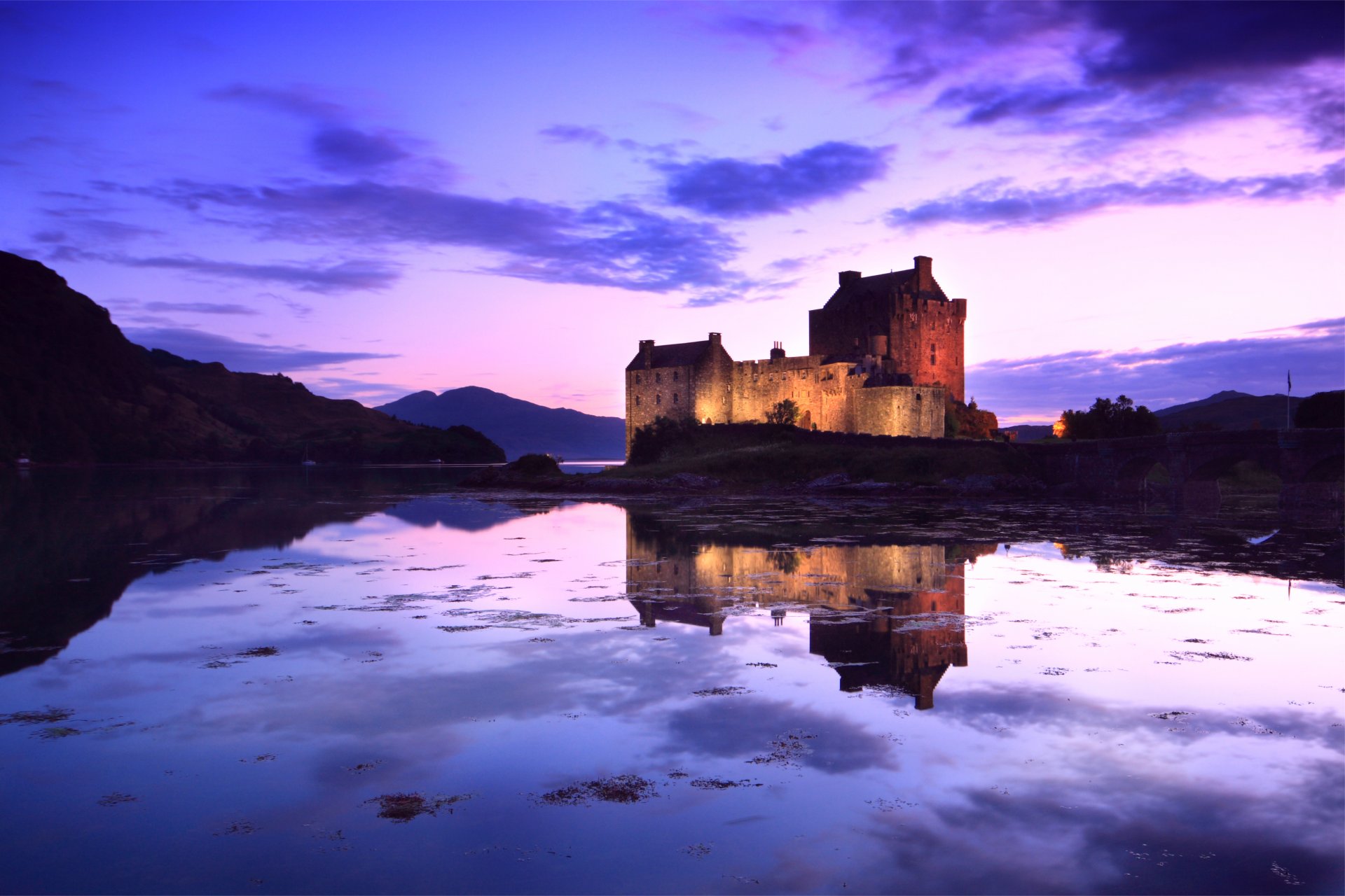 great britain scotland castle fortress illumination lilac evening sky clouds bridge pond water reflection