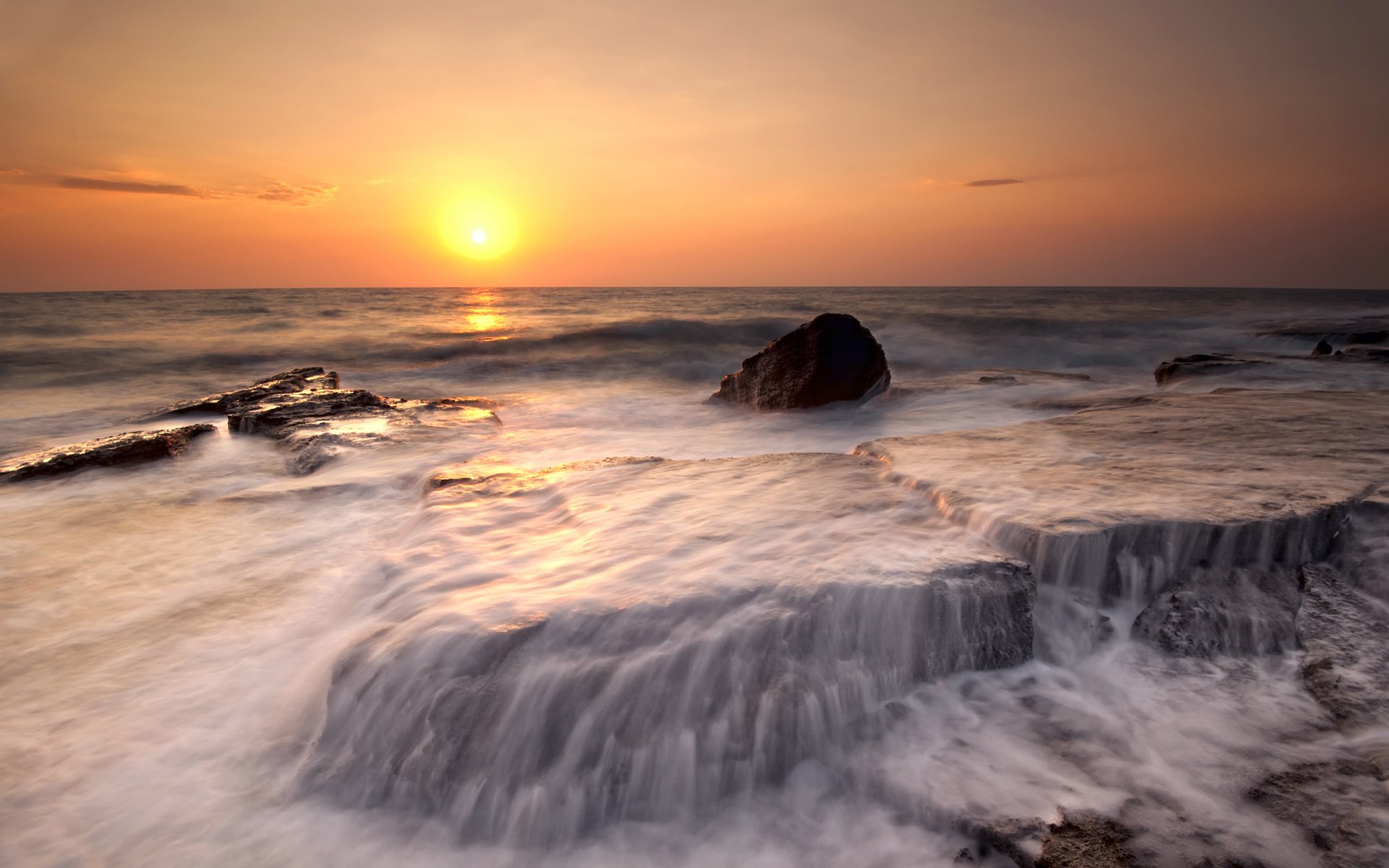 cyprus evening sun orange sunset sea coast beach night stones water flows wave