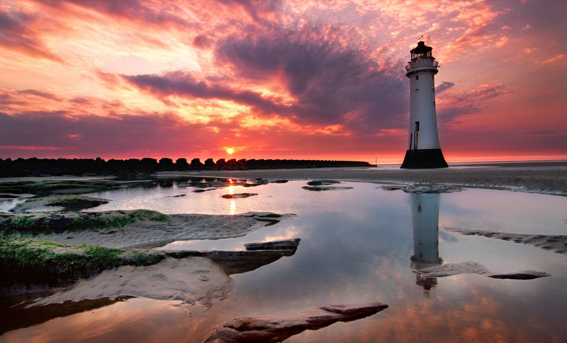 tramonto faro riva