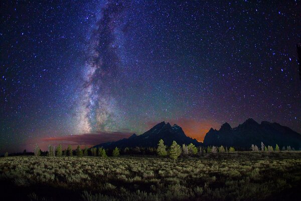 Beautiful Milky Way on the background of mountains