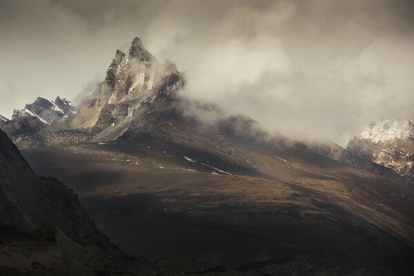 The dance of rocks and clouds somewhere high in the mountains