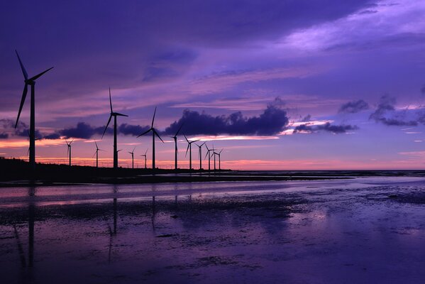 Lilac sunset on the sea among the clouds