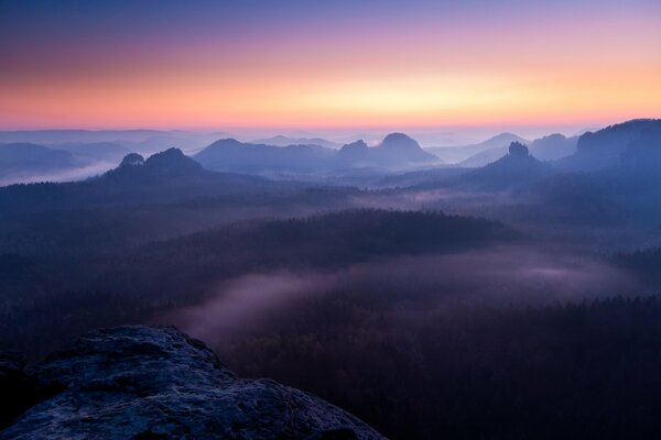 Serene mountains against the background of dawn