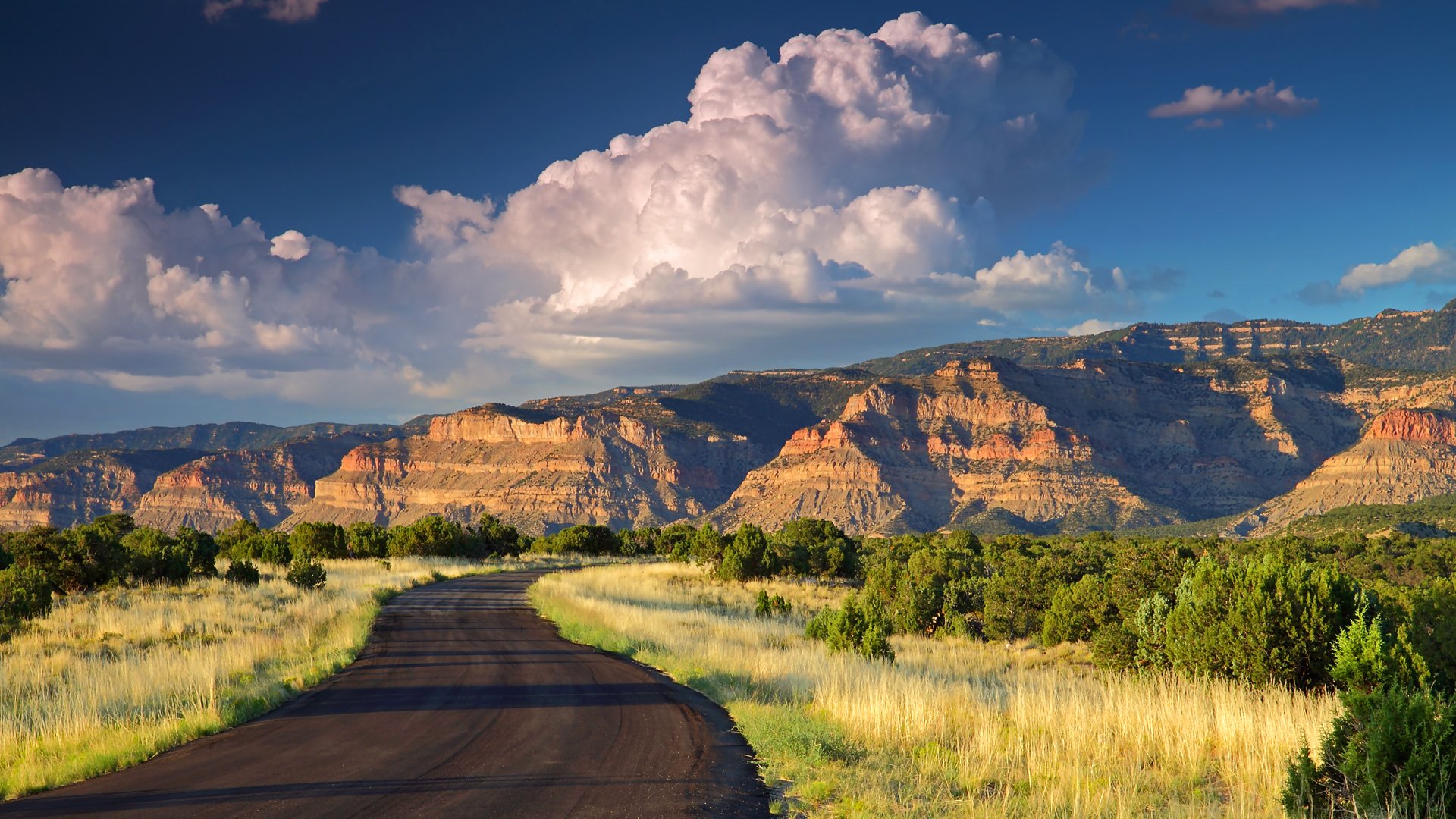 dawn road mountain clouds utah