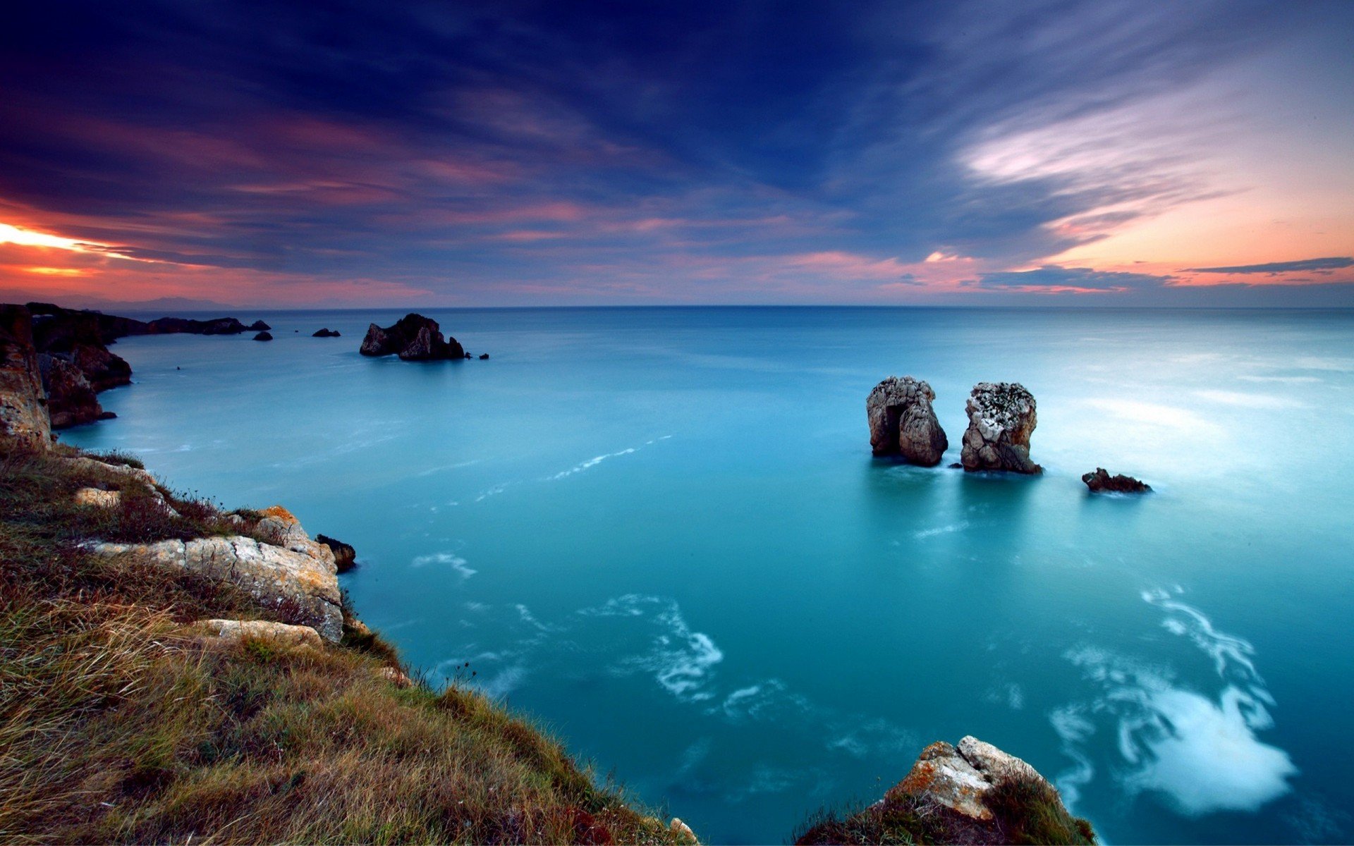 mare cielo rocce tramonto