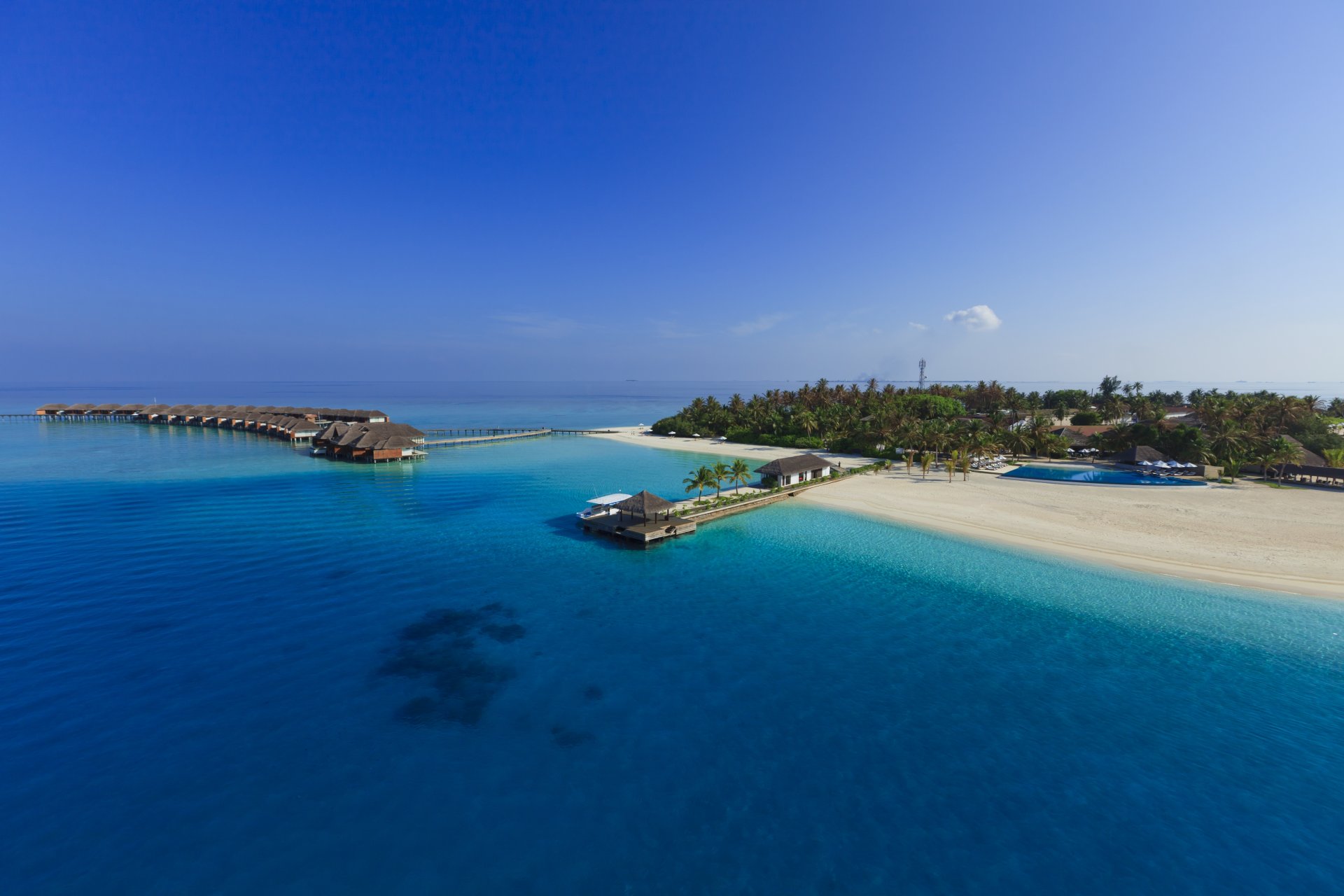 bungalows on stilts over the sea the maldives paradise island blue water