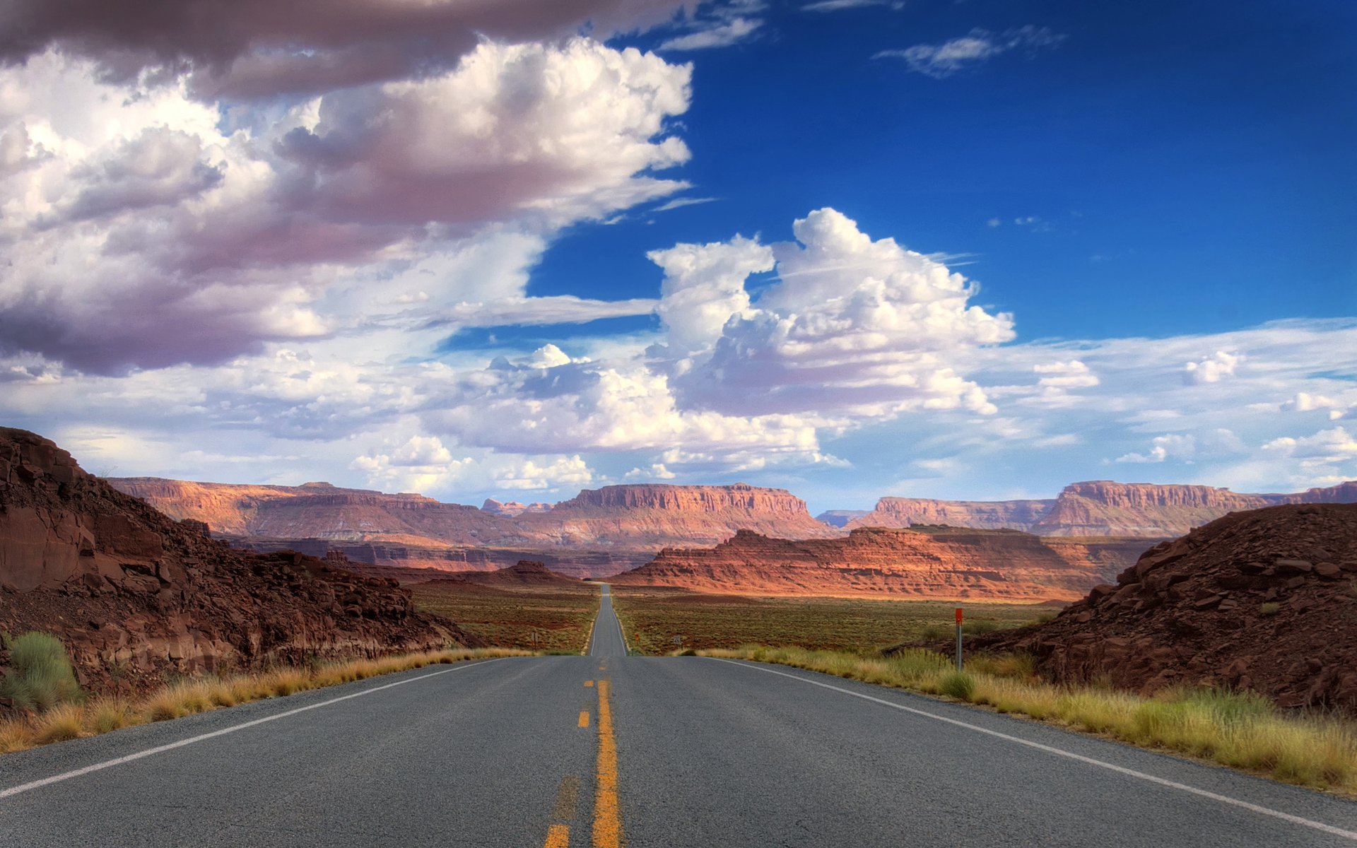 road roads landscapes nature path paths way stone stones rock rocks mountains mountain line strip stripes dividing strip asphalt sky cloud america states desert deserts usa