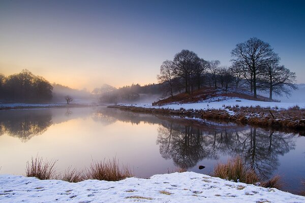 Winter morning, fog over the river